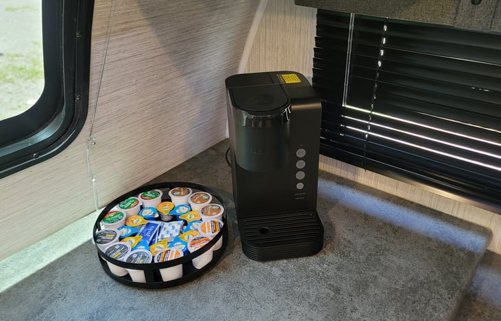 Need a pick-me-up to get the day started before your outdoor adventures? Make a cup of coffee or tea with your onboard keurig.