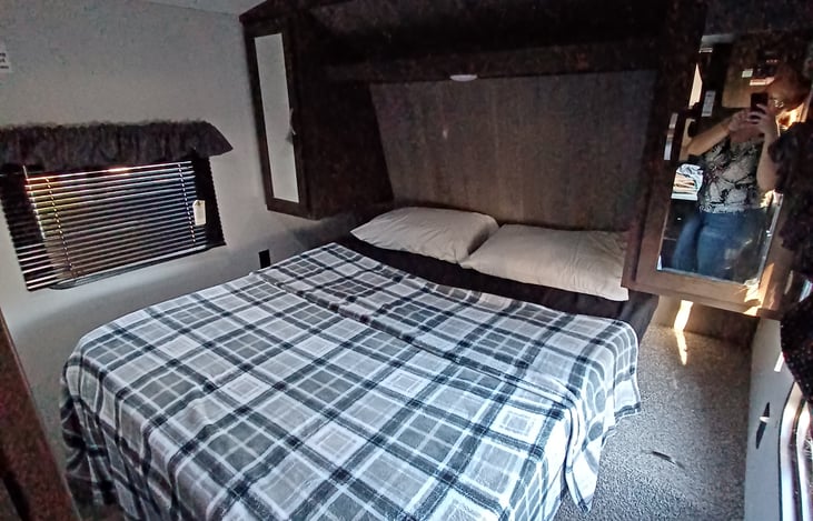 The main bedroom. The closets have hangers for your convenience and additional blankets are under the bed.