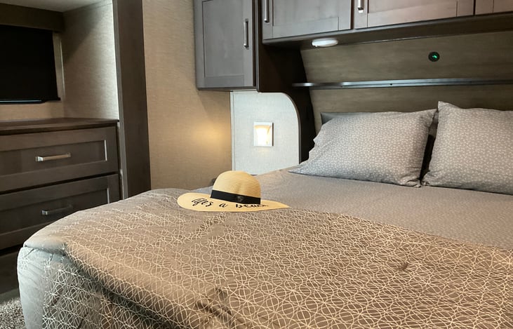 Overhead storage is in abundance. Also there is a large two drawer dresser to store even more of your things.