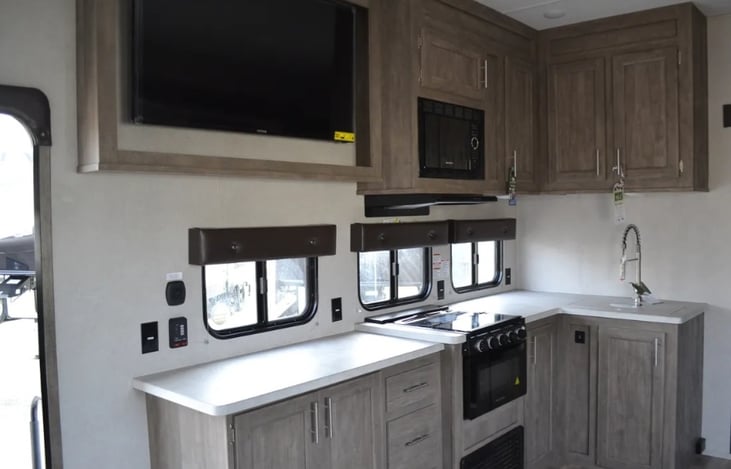 Open kitchen with lots of counter space. Cookware and dishes provided.