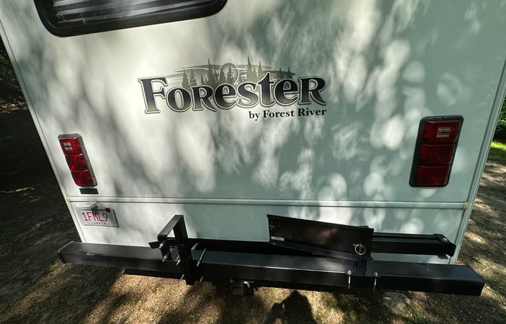 Back of the rig with grill and spare tire mounts