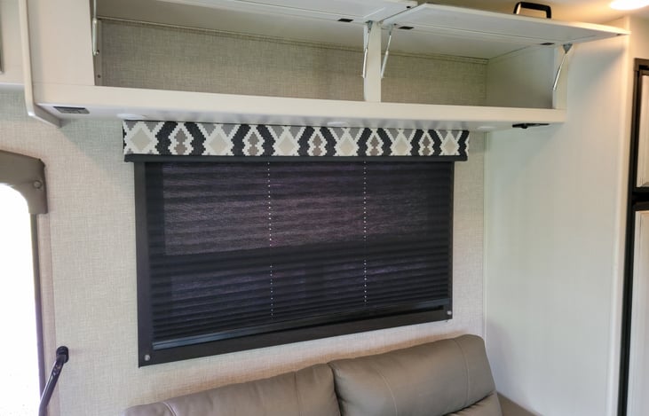 Additional overhead storage above sofa!