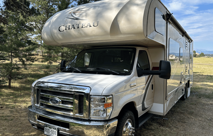 The RV is 31 feet long providing guests with ample comfortable sitting area for 6 adults and 2 children. There are seatbelts in the kitchenette area-one with a tether. There are six screened windows.