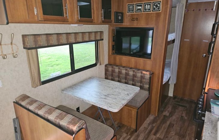 Galley table up. Bunk beds in the back.