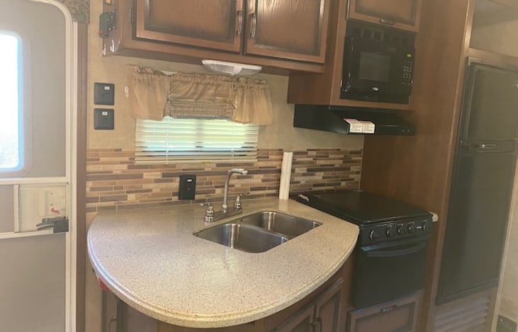 Kitchen equip with oven and microwave