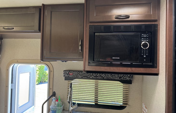 Microwave and upper storage cabinets