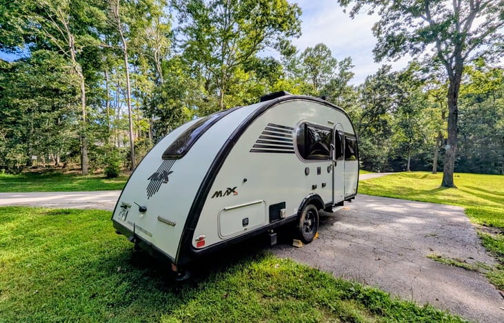 Rugged, cozy and classy, this easy-to-tow 2021 Little Guy Max is loaded with features and accommodations including Rough Rider package, solar, solid wood cabinetry, Queen bed, pop-out windows & more.