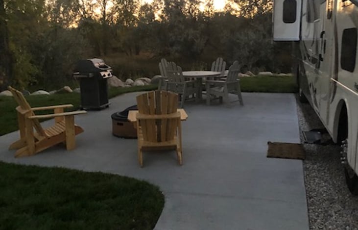 KOA camp ground!  When you set your reservation at KOA ask for sight with patio furniture and BBQ.  They are great!!