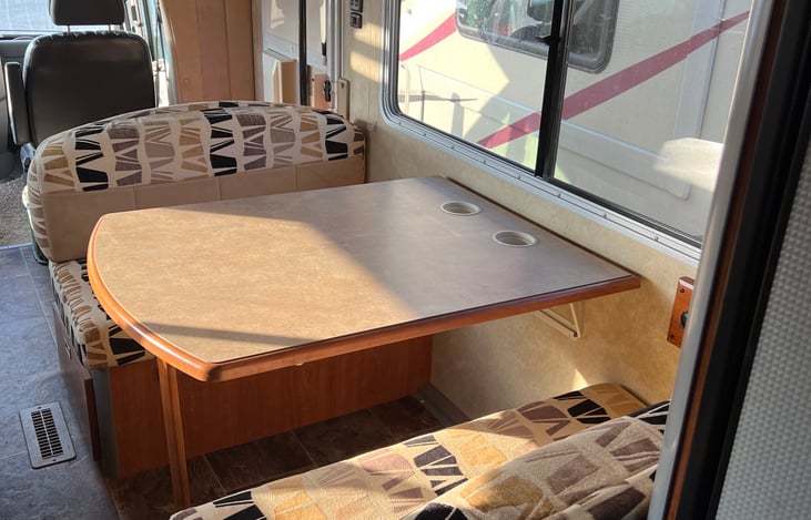 Dinette ... Love the layout of this RV.  Couch and Dinette close together with kitchen behind that makes for easy cooking and socializing.