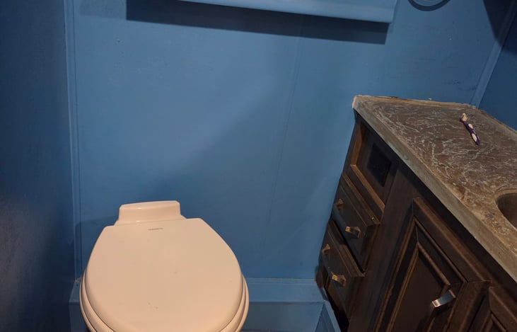 Bathroom with new floor and toilet
