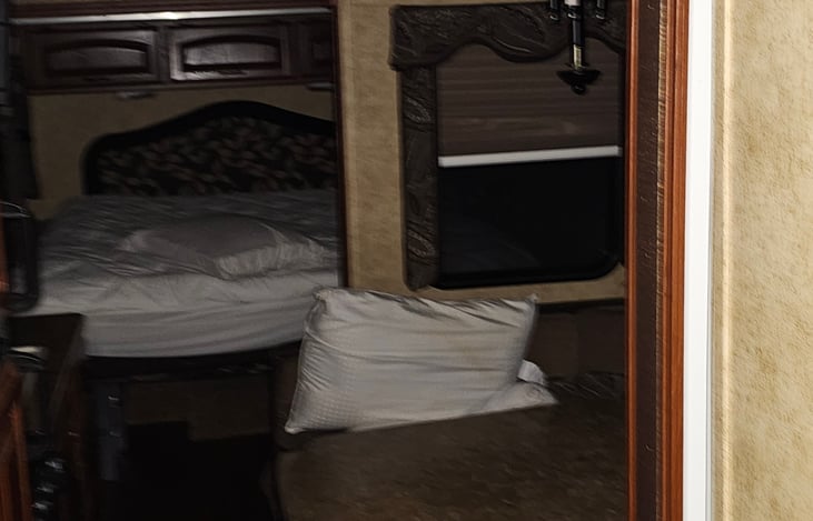 Queen slide out and dinning area sleeping area