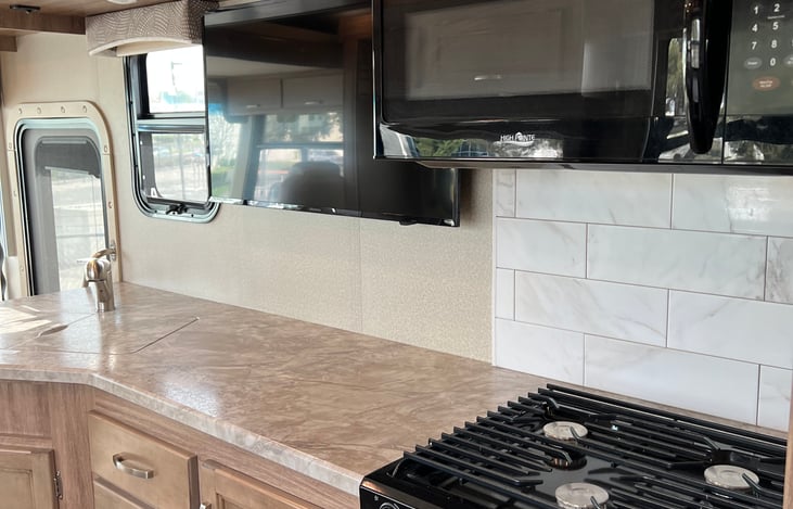 Stove, Microwave, & TV View