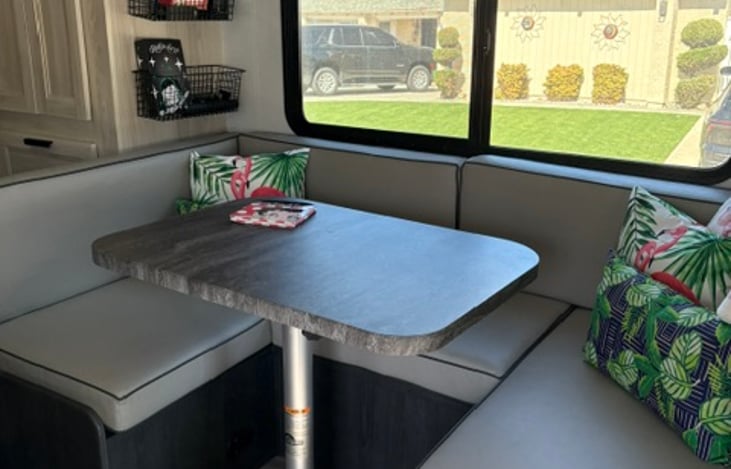 Bench table seating that folds down into your third bed. Table can be turned horizontal or lengthwise for your comfort.