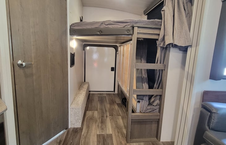 Bottom Bunk folds up for storage