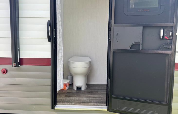 Rear door for easy bathroom access from the outside.