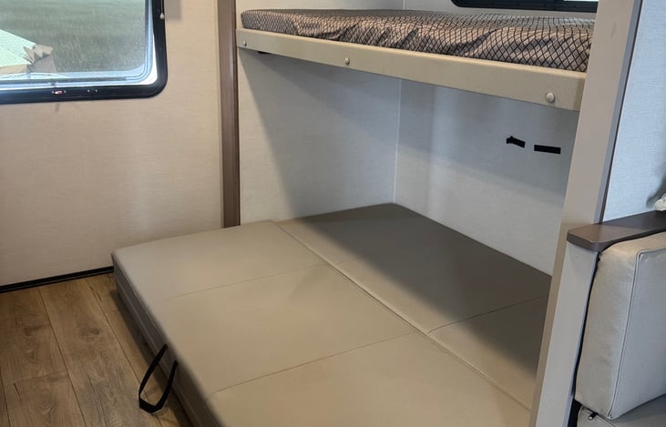 Rear sofa folded out into a queen (short) bed