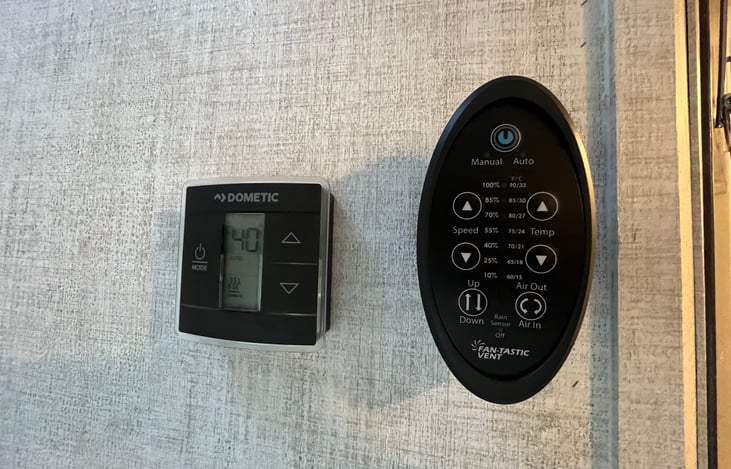 Upgraded fan with remote and thermostat.