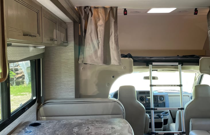 Kitchen table that folds down into sleeper