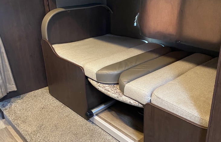 Lower bunk ready for sheets and sweet dreams