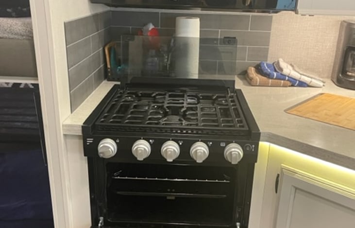 Stove range and oven.