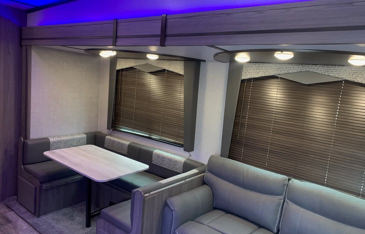 Living area with fold down dinette and couch