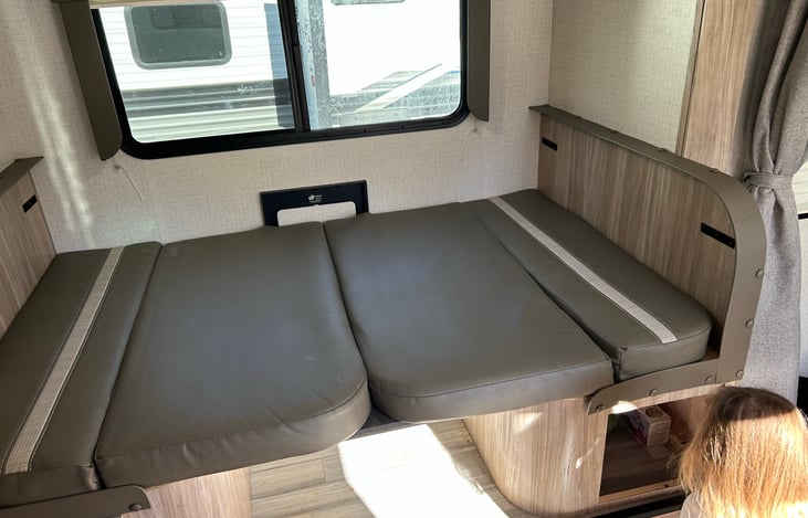 The dining table when converted to a bed. This converts incredibly easily. It just lights up and down.