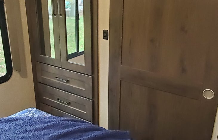 Room for hanging clothes and drawers