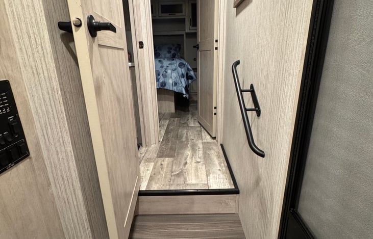 Hallway to main bathroom and master bedroom.