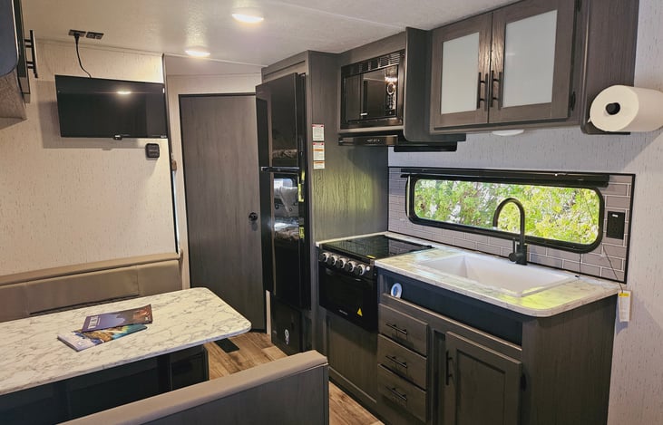 Kitchen & dining area with Roku TV