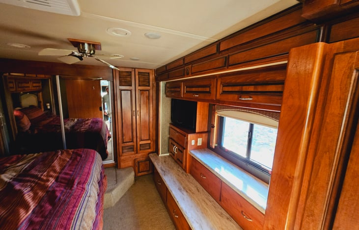 Master bedroom with King bed and ultra high-end bedding TV