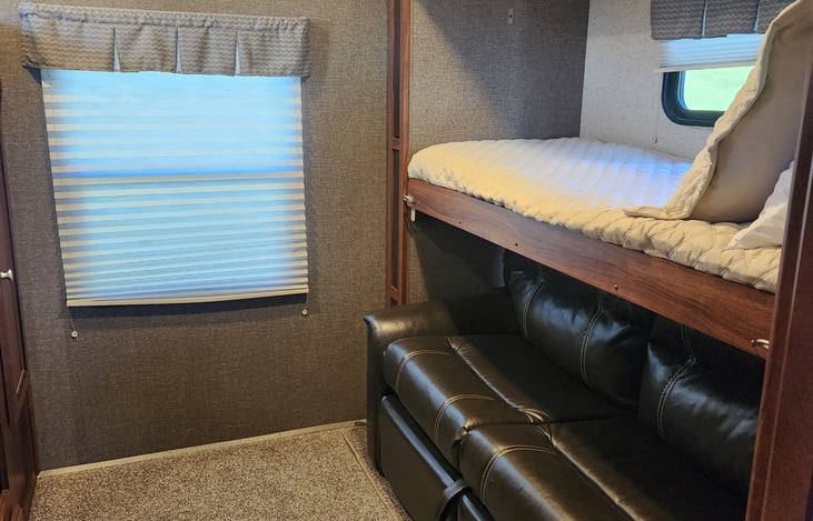 Flip up bunk bed for more room to lounge. Fold out couch for more sleeping area.