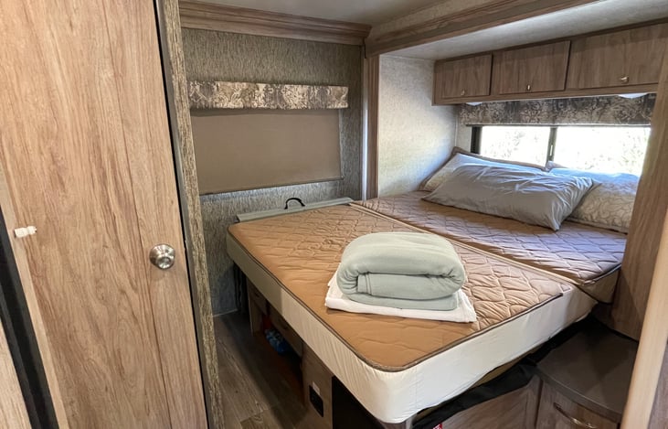 Master queen bed on slide out