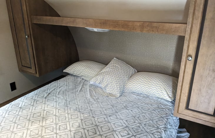 Front queen bed with updated memory foam matress.