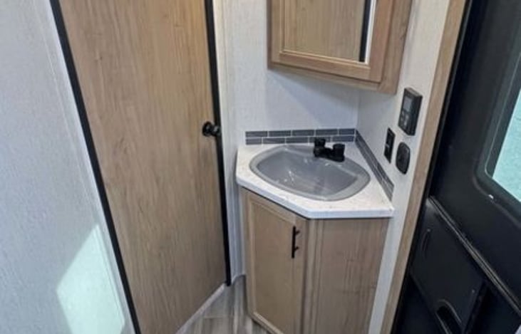 Bathroom vanity sink and mirror