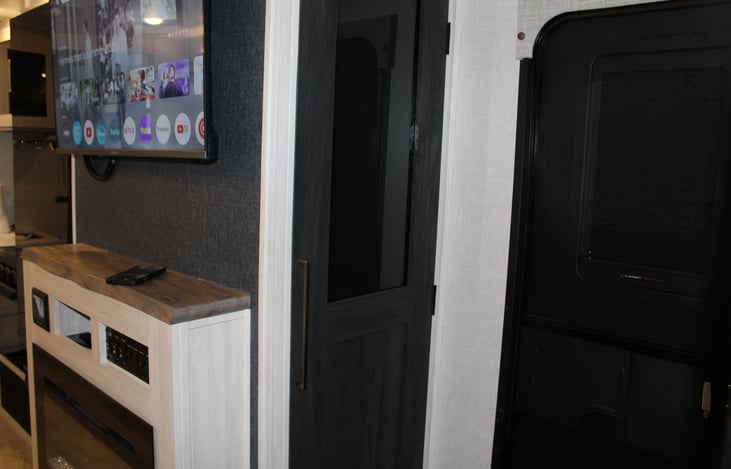 Walk in pantry behind the entertainment