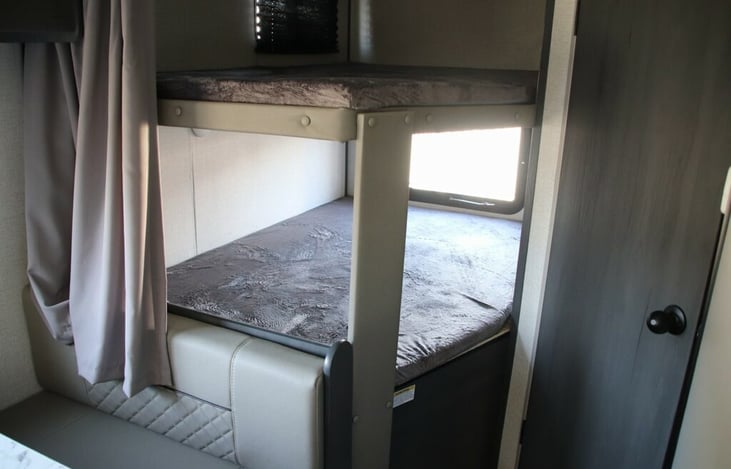 Lower bunk, full-size up too 2 adults