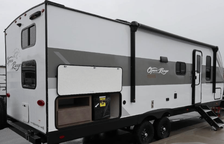 Outside with outdoor kitchen area, front door entrance and stairs :)