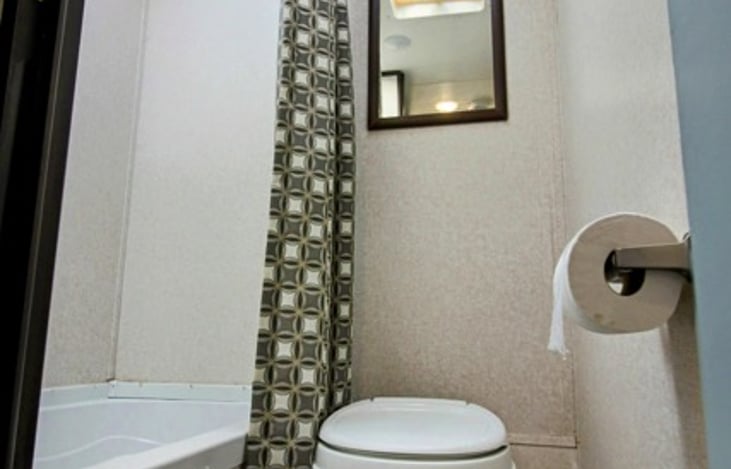 shower / tub combo for your littles. Toilet is completely separate.