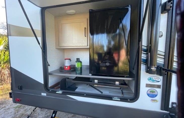 Outdoor Kitchen with Mini Fridge and burner