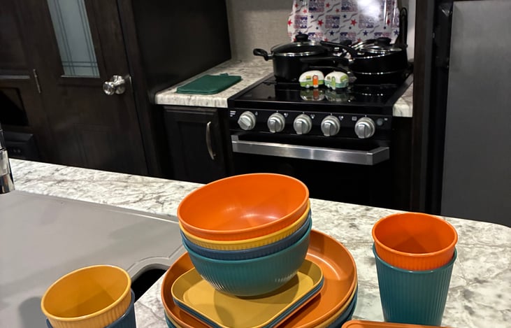 Heavy duty weaved camping dinner plates, saucers, bowls, drinking cups, and utensils for four!