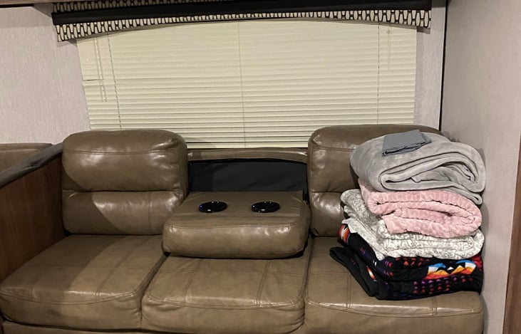 Sofa folds out like a futon for comfortable sleeping.