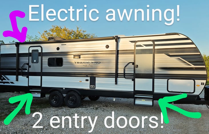 2 entry doors to choose from with an electric awning!