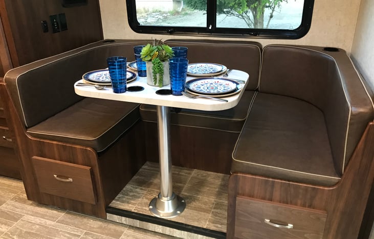 U-shaped dinette allows amble seating and comfort.