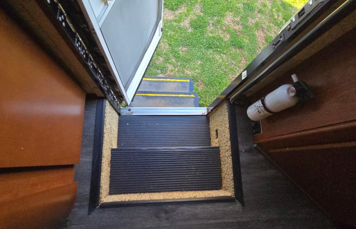 Easy access fire extinguisher at entryway