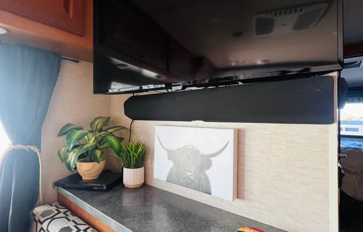 Smart TV, sound bar and DVD player