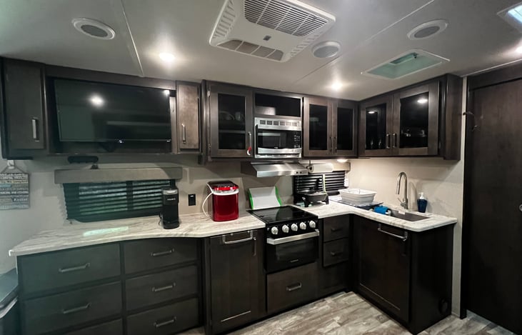 Large kitchen with plenty of counter space. Country kitchen sink.