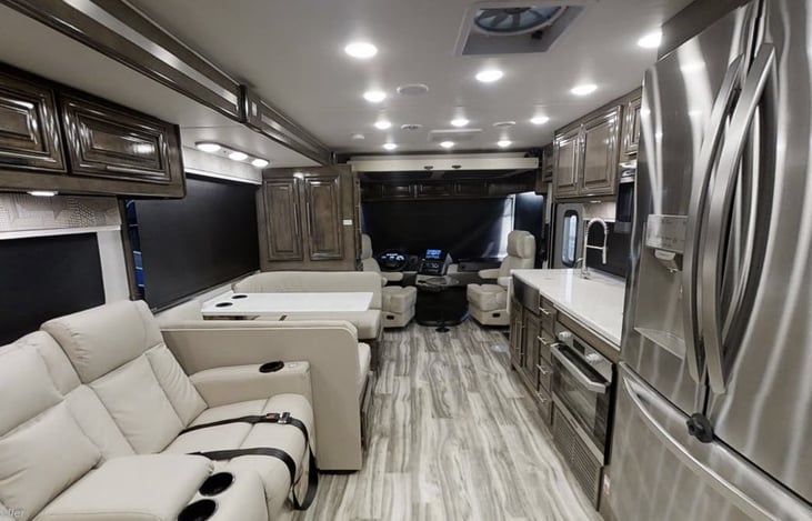 Captain's chairs with massage and recline almost flat.