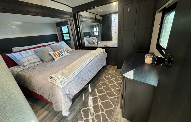 Master bedroom - large closets, under bed storage and a dresser.