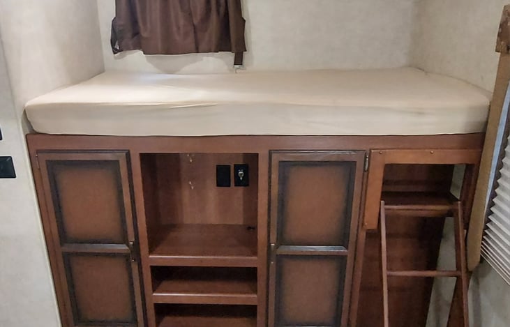 Upper Bunk and Storage in Bunk Room