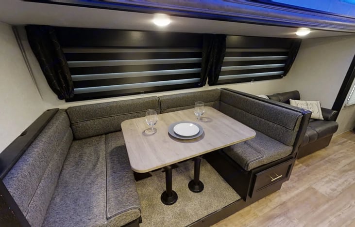 Dinette converts to a full size .
Couch converts to a twin size .